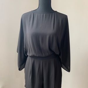 NWOT White House Black Market black romper. Size 0